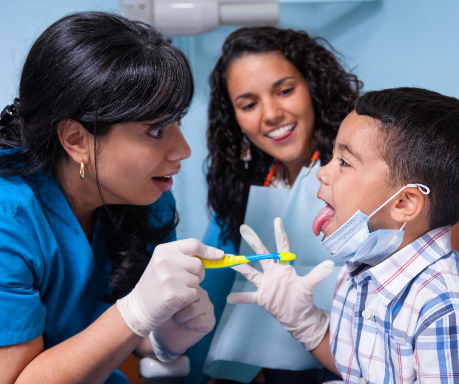 Dr. Srinidhi Bhatt with a child patient